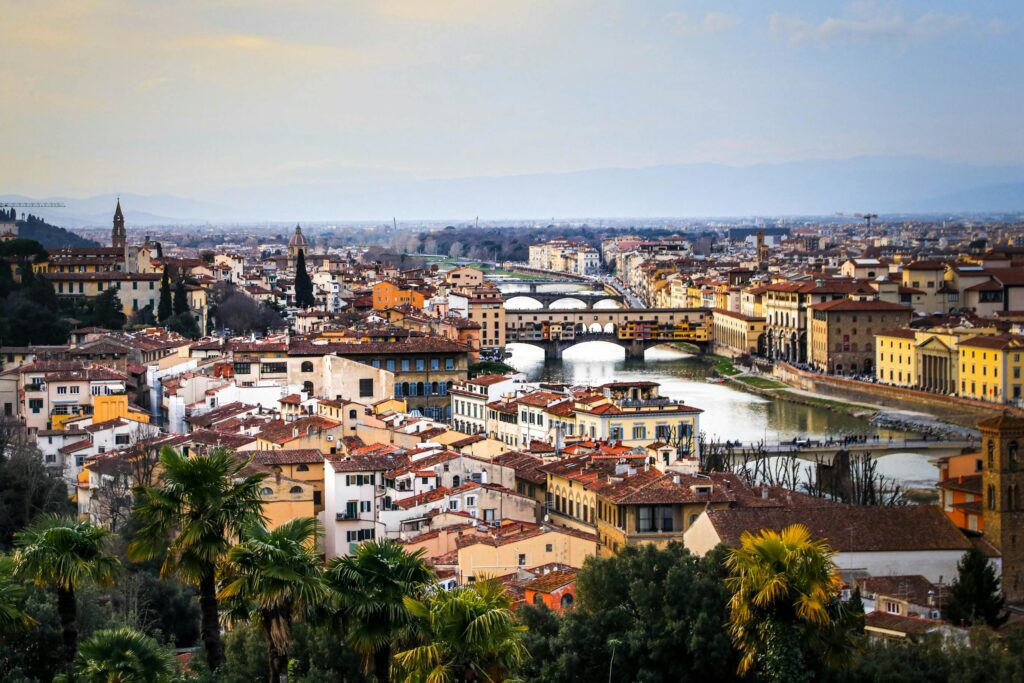 Explore Florence's iconic landmarks and picturesque landscape from a bird's eye perspective.